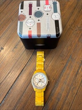 Fossil stainless steel and yellow watch with fossil storage tin